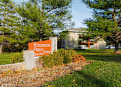 Thumbnail 74 of 90 - A sign for Rosemont Place is in front of a building at Rosemont Place Apartments, Iowa