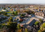 Thumbnail 89 of 90 - A bird's eye view of a residential area with houses and trees. at Rosemont Place Apartments, Des Moines, IA, 50320