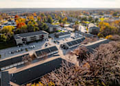 Thumbnail 88 of 90 - A bird's eye view of a residential area with houses and trees. at Rosemont Place Apartments, Iowa, 50320