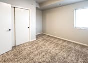 Thumbnail 31 of 56 - A room with large windows at Meadowlark Place Apartments, IA, 50111