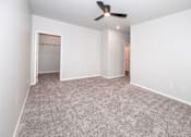 Thumbnail 46 of 56 - A room with a ceiling fan at Meadowlark Place Apartments, Iowa, 50111