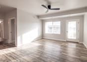 Thumbnail 2 of 56 - An empty living room at Meadowlark Place Apartments, Grimes, IA