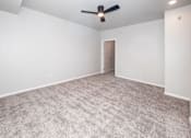 Thumbnail 42 of 56 - Large empty room at Meadowlark Place Apartments, Grimes, IA