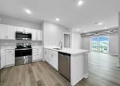Thumbnail 18 of 69 - a kitchen with white cabinets and stainless steel appliances at Converge NW, Waukee Iowa  