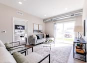 Thumbnail 2 of 69 - a living room with a couch and a table at Converge NW, Waukee Iowa  