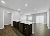 Thumbnail 28 of 57 - the kitchen is open to the living room and dining room at Rialto Townhomes Apartments, Waukee, IA