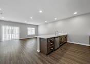 Thumbnail 34 of 57 - the kitchen is open to the living room and dining room at Rialto Townhomes Apartments, Waukee, 50263
