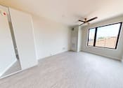 Thumbnail 11 of 27 - Carpeted Bedroom at Canary Lofts, Iowa