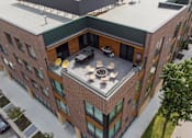 Thumbnail 24 of 27 - Aerial Building View at Canary Lofts, Des Moines, IA
