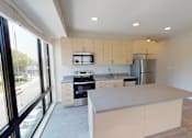 Thumbnail 5 of 27 - Large Kitchen at Canary Lofts, Des Moines, Iowa