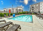 Thumbnail 24 of 31 - Pool With Sundecks at Lake Shore Apartments, Ankeny