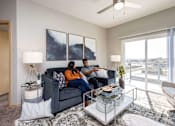 Thumbnail 6 of 31 - Modern Living Room at Lake Shore Apartments, Ankeny
