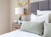 Thumbnail 8 of 31 - Bedroom With Pillows at Lake Shore Apartments, Ankeny, Iowa