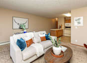 Thumbnail 8 of 22 - a living room with a couch and a table at Lake Shore Park, Ankeny, Iowa