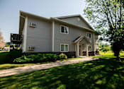 Thumbnail 8 of 10 - A house with a grey siding at Peach Tree Apartments, Ankeny, Iowa