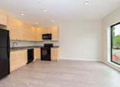 Thumbnail 13 of 26 - Open Concept Kitchen at Rowat Lofts, Des Moines, IA, 50309