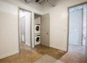 Thumbnail 20 of 39 - Laundry room with a washer and dryer in it at Clemens Building, Des Moines, IA