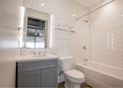 Thumbnail 35 of 39 - Bathroom With Extra Storage Space and a bathtub at Clemens Building, Iowa