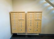 Thumbnail 15 of 19 - Two large filing cabinets with numbered drawers are standing next to each other at The Hampton Meadows Apartments, IA,50315