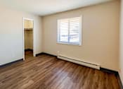 Thumbnail 12 of 19 - A room with large window at The Hampton Meadows Apartments,Iowa