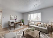 Thumbnail 1 of 19 - A well-lit living room with a dining table and a couch at The Hampton Meadows Apartments,Des Moines, Iowa