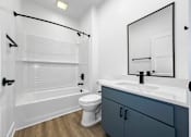 Thumbnail 4 of 30 - a bathroom with a sink toilet and a shower  at Matilda 235 Townhomes, Des Moines, 50309