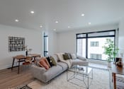 Thumbnail 1 of 30 - Modern Living Room at Matilda 235 Townhomes, Des Moines