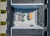 Thumbnail 23 of 30 - an overhead view of a bathroom with a sink and a shower at Matilda 235 Townhomes, Des Moines