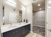 Thumbnail 10 of 34 - a bathroom with a sink and a shower at Linc, Des Moines, 50309  
