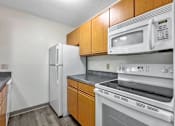 Thumbnail 4 of 30 - Fully Equipped Kitchen at Hamlet Apartments, West Des Moines
