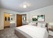 Thumbnail 3 of 40 - a bedroom with a large bed and a closet at Autumn Park, Sioux Falls  