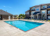 Thumbnail 28 of 50 - our apartments at the district feature a resort style swimming pool at Stonegate Crossing Apartments, Clive, 50325