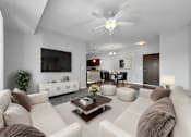 Thumbnail 1 of 50 - a white living room with couches and a coffee table at Stonegate Crossing Apartments, IOWA, 50325