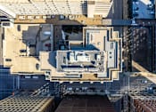 Thumbnail 46 of 50 - A top-down view of a cityscape with buildings and vehicles.