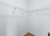 Thumbnail 73 of 77 - Walk-in closet with wire shelving at The Flats at West Glen Apartments, Iowa, 50266