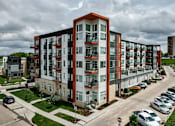 Thumbnail 40 of 40 - an aerial view of an apartment building on a city street at Velocity Apartments, Iowa, 50309