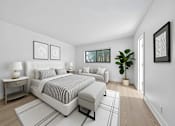 Thumbnail 4 of 21 - A bedroom with a large bed and a couch.