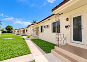 Thumbnail 4 of 19 - A row of houses with number 390 on the front door.