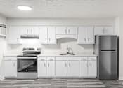 Thumbnail 3 of 16 - A modern kitchen with white cabinets and appliances.