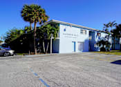 Thumbnail 17 of 23 - A building with a sign that says Harbor Blue.