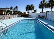 Thumbnail 18 of 21 - A swimming pool with a 6ft depth sign and no diving sign.