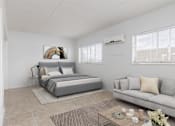 Thumbnail 6 of 26 - a bedroom with a bed and a couch