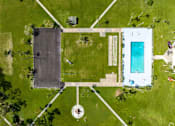 Thumbnail 21 of 25 - a birds eye view of a basketball court with a blue pool