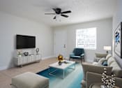 Thumbnail 2 of 12 - a living room with a couch and a ceiling fan