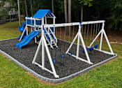Thumbnail 8 of 11 - a playground with a swing set and a slide