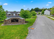 Thumbnail 30 of 30 - A sign that says Grand View Estates is on a stone pillar.