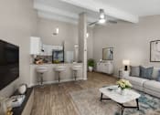 Thumbnail 5 of 17 - A living room with a white couch and a coffee table.