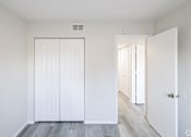Thumbnail 6 of 12 - A white door with a window above it.