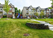Thumbnail 4 of 35 - Open Playing Area at Encore Townhomes, Utica, MI, Michigan