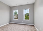 Thumbnail 24 of 35 - Bedroom With Expansive Windows at Encore Townhomes, Utica, Michigan